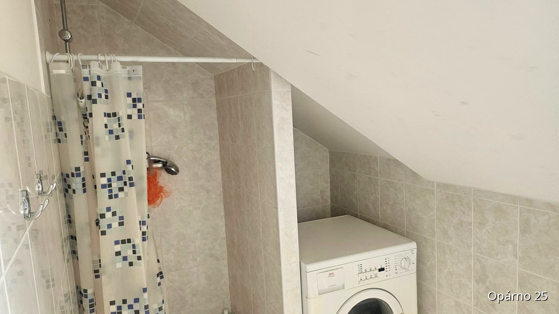 Attic bathroom with shower.